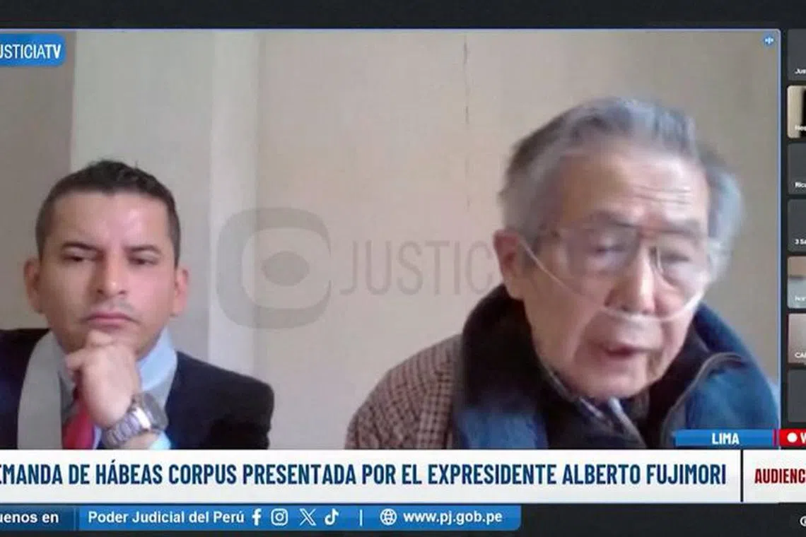 Judge Nestro Paredes listens as former Peruvian President Alberto Fujimori speaks during a digital hearing, in Lima, Peru October 4, 2023, in this screen grab obtained from a video.     Courtesy of Peruvian Justice TV/Handout via REUTERS