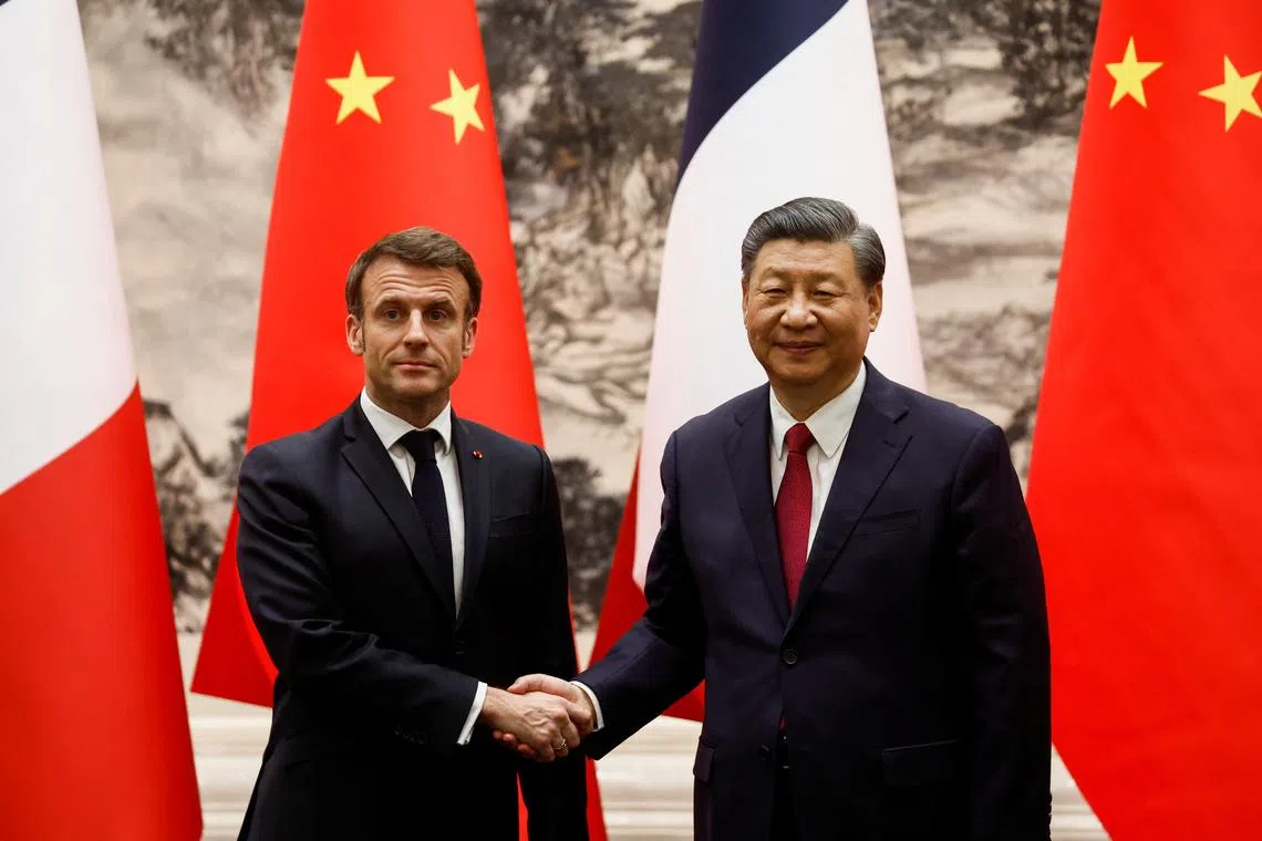 Chinese President Xi Jinping welcoming French President Emmanuel Macron at a signing ceremony at the Great Hall of the People, in Beijing on April 6, 2023.
