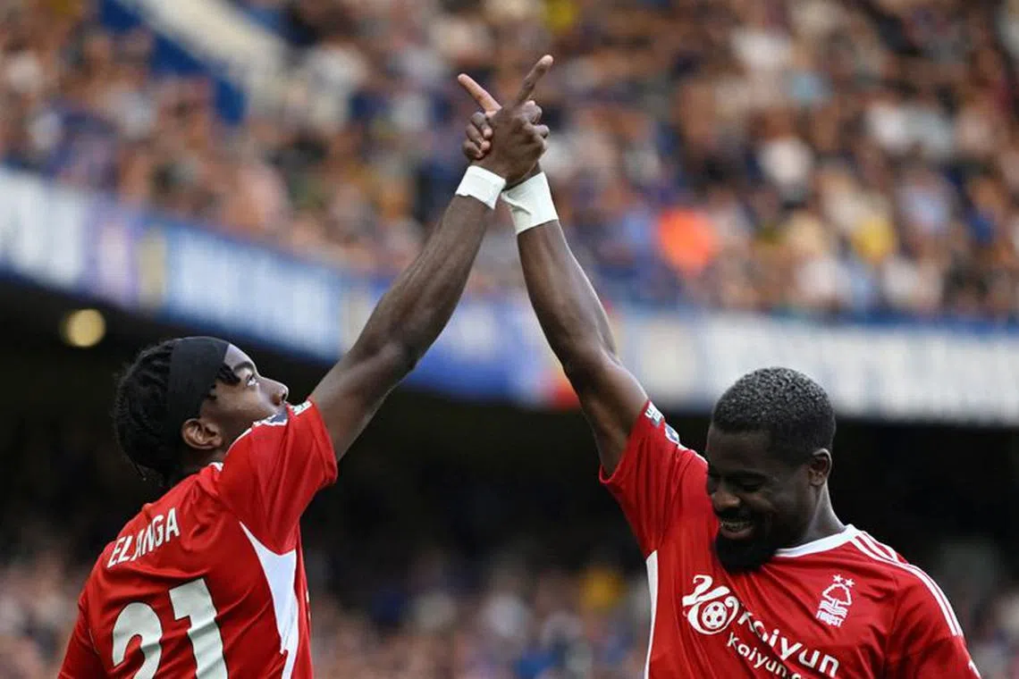 Soccer Football - Premier League - Chelsea v Nottingham Forest - Stamford Bridge, London, Britain - September 2, 2023 Nottingham Forest's Anthony Elanga celebrates scoring their first goal with Serge Aurier REUTERS/Tony Obrien