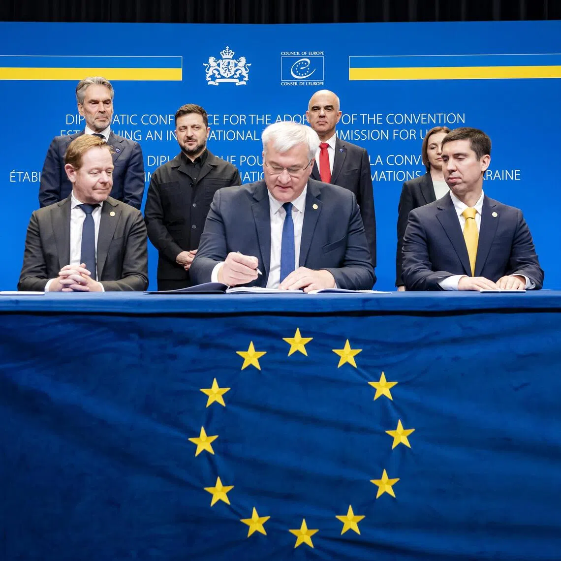 (Back row, from left) Dutch Prime Minister Dick Schoof, Ukrainian President Volodymyr Zelensky and Council of Europe Secretary-General Alain Berset attending the Dec 16 signing ceremony with Dutch Foreign Minister David van Weel (left) and Ukrainian Foreign Minister Andrii Sybiha.