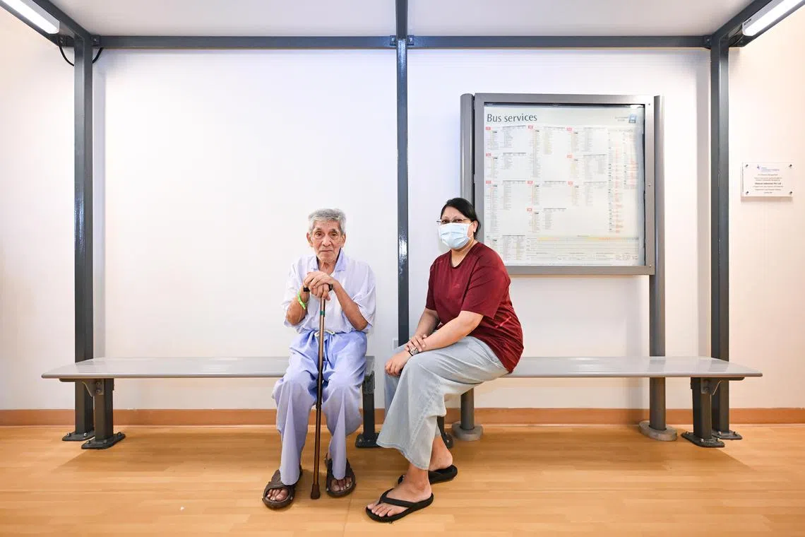 ST20250312-202559200955-Lim Yaohui-Amrita Kaur Gurder Singh-akdementia25/
Mr Sulaimanjee Bin Ahmad Patail, 82, retiree, with his daughter Ms Suriahni Bte Sulaimanjee, in her early 40s, associate executive in the healthcare industry, sitting at a bus stop inside a dementia ward at Yishun Community Hospital on March 12, 2025.
How hospitals and nursing homes spruce up their environment to help patients, including those with dementia, thrive.
(ST PHOTO: LIM YAOHUI)