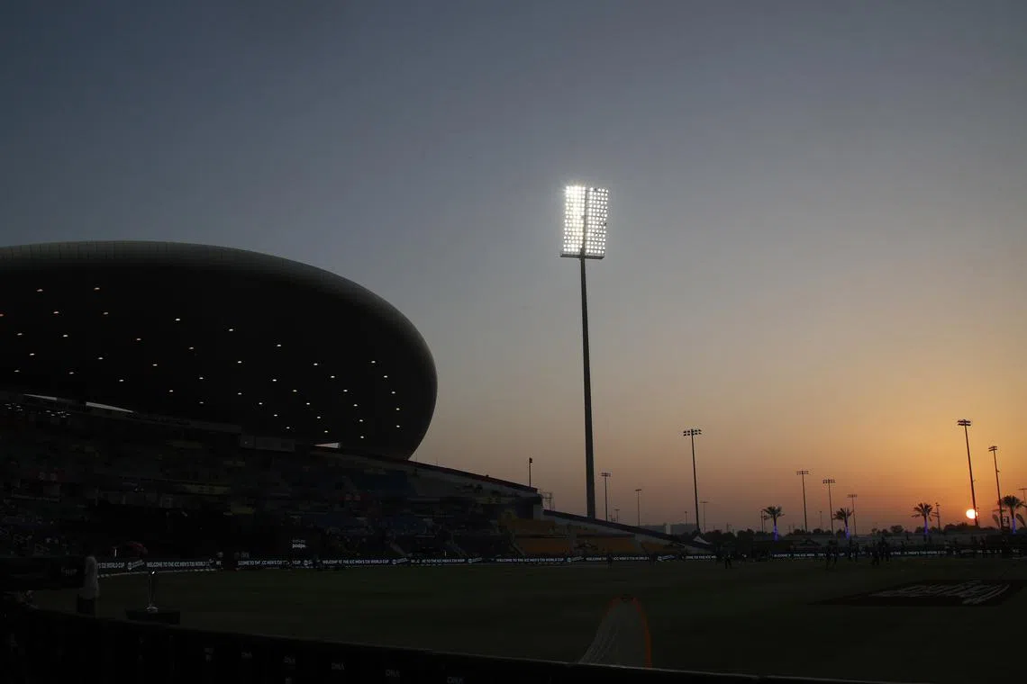 FILE PHOTO: General view of the Sheikh Zayed Cricket Stadium, Abu Dhabi, as the sun sets before play, November 3, 2021. REUTERS/Hamad I Mohammed/File Photo