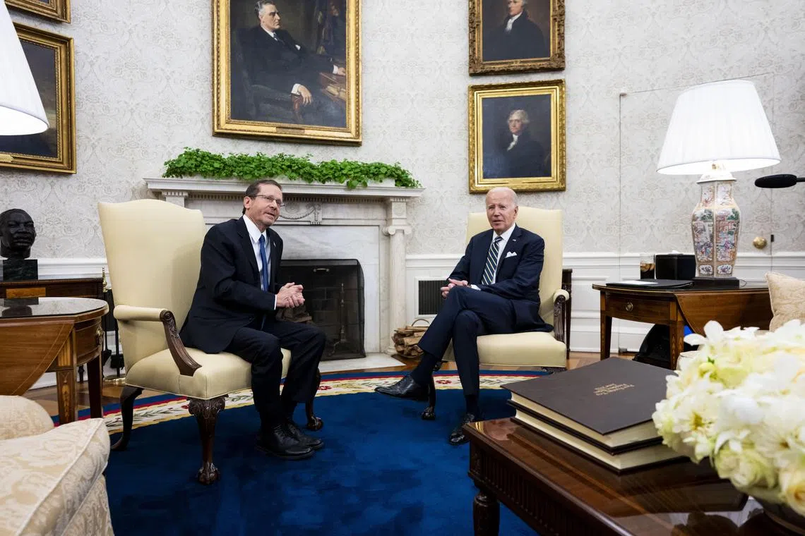 US President Joe Biden (right) told Israeli President Isaac Herzog that America’s commitment to Israel was firm and ironclad.