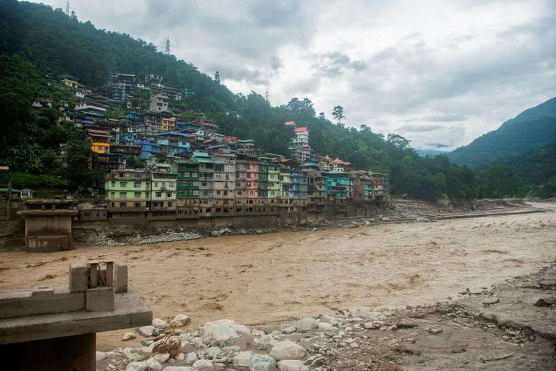 Remains of the bridge connecting Adarsh gaon with Singtam is pictured along the bank of Teesta River at Singtam in Sikkim, India October 5, 2023. REUTERS/Wang Chen NO RESALES. NO ARCHIVES