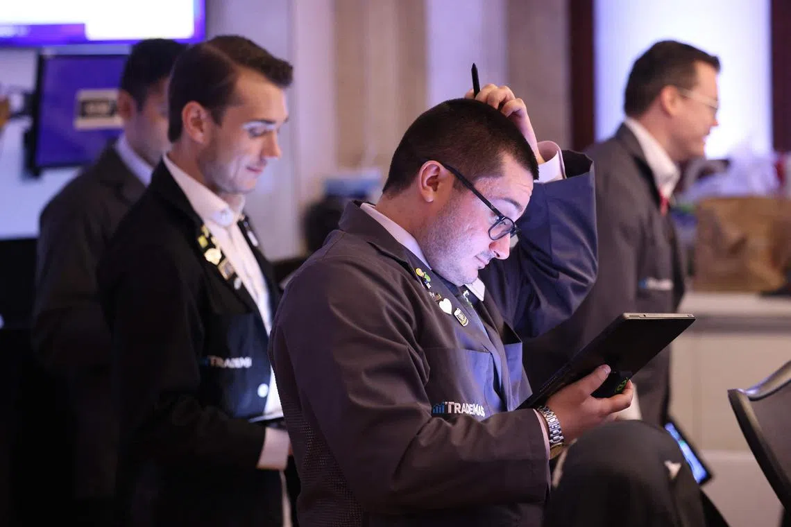 NEW YORK, NEW YORK - AUGUST 20: Traders work on the floor of the New York Stock Exchange during morning trading on August 20, 2024 in New York City. Stocks opened up with little change as the S&P 500 attempts to continue consecutive days of gains.   Michael M. Santiago/Getty Images/AFP (Photo by Michael M. Santiago / GETTY IMAGES NORTH AMERICA / Getty Images via AFP)