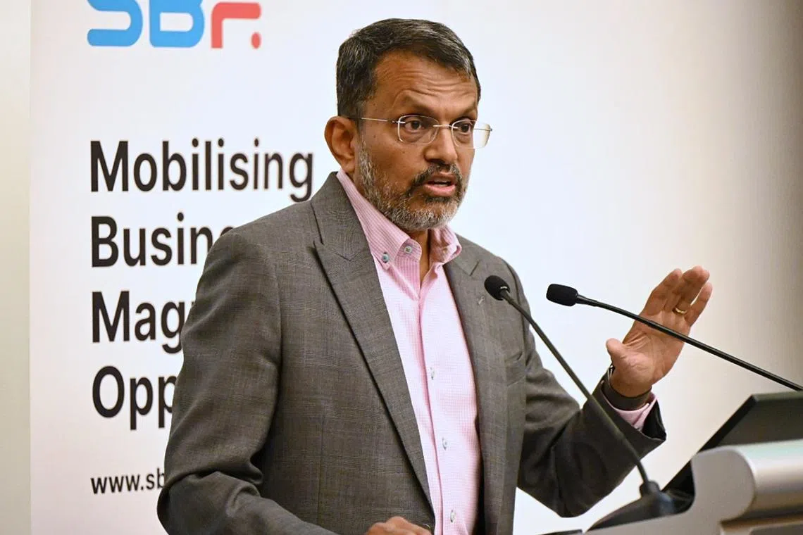 Singapore’s ambassador for climate action Ravi Menon warned about risks that climate change will pose to businesses.