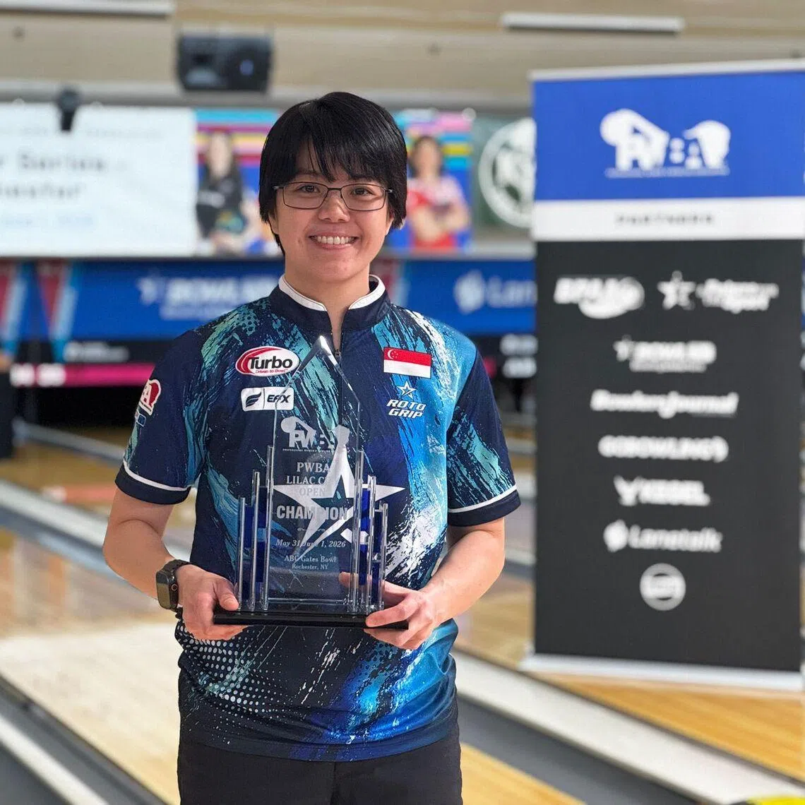 National bowler Cherie Tan posing with her PWBA Lilac City Open title on June 1 after securing her first win in two years.