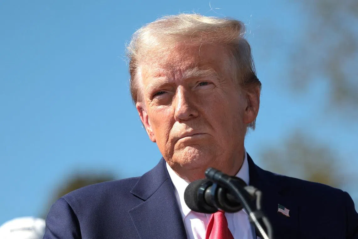 SWANNANOA, NORTH CAROLINA - OCTOBER 21: Republican presidential nominee, former U.S. President Donald Trump, delivers remarks as he visits a neighborhood affected by Hurricane Helene on October 21, 2024 in Swannanoa, North Carolina. Trump is campaigning throughout North Carolina today as he and Democratic presidential nominee, U.S. Vice President Kamala Harris continue to campaign in battleground swing states ahead of the November 5th election.   Win McNamee/Getty Images/AFP (Photo by WIN MCNAMEE / GETTY IMAGES NORTH AMERICA / Getty Images via AFP)