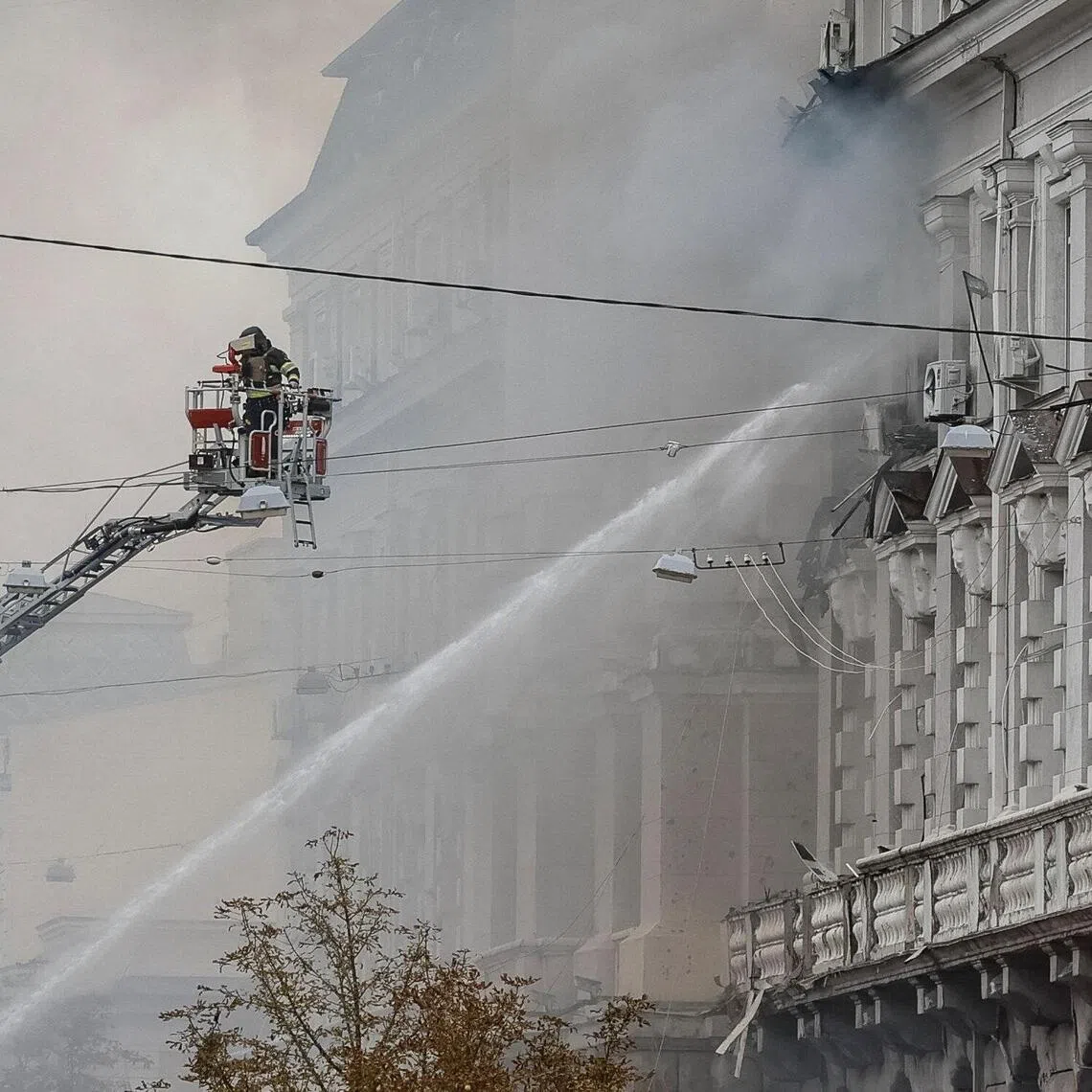 A firefighter working at the headquarters of Ukraine’s SBU security service after a Russian drone strike on Sept 4.