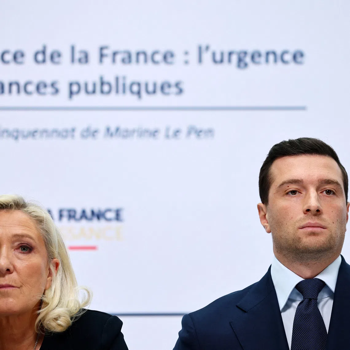 French far-right leader Marine Le Pen, member of parliament for the French far-right Rassemblement National (National Rally - RN) party and candidate for the 2027 French presidential election, and Jordan Bardella, president of the French far-right Rassemblement National party, attend a press conference to present the party's alternative budget for 2027 and its fiscal strategy, in Paris, France, October 6, 2026. REUTERS/Sarah Meyssonnier