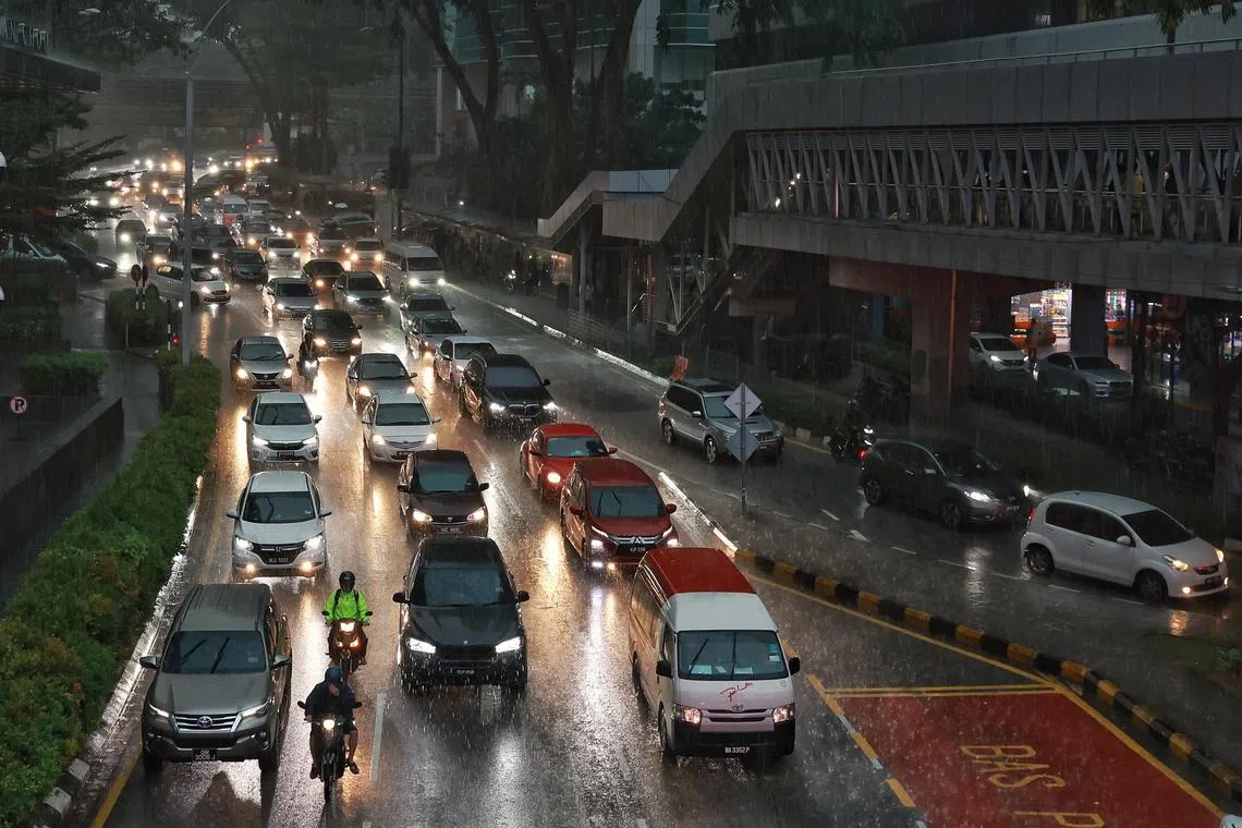 Traffic during wet weather in Bukit Bintang. Generic scenes in Kuala Lumpur, Malaysia, on March 22, 2023.
