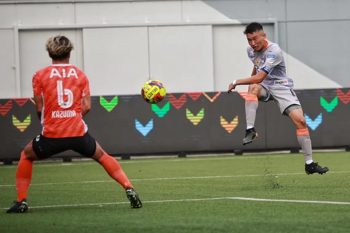 Albirex Niigata’s captain Asahi Yokokawa (right) scoring his second goal against Hougang United during a Singapore Premier League match at Jalan Besar Stadium in May 6, 2023.