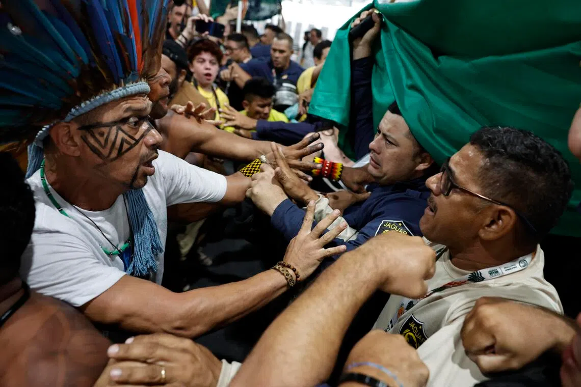 Protesters clashing with security personnel at the COP30 climate talks on Nov 11 in Belem, Brazil.