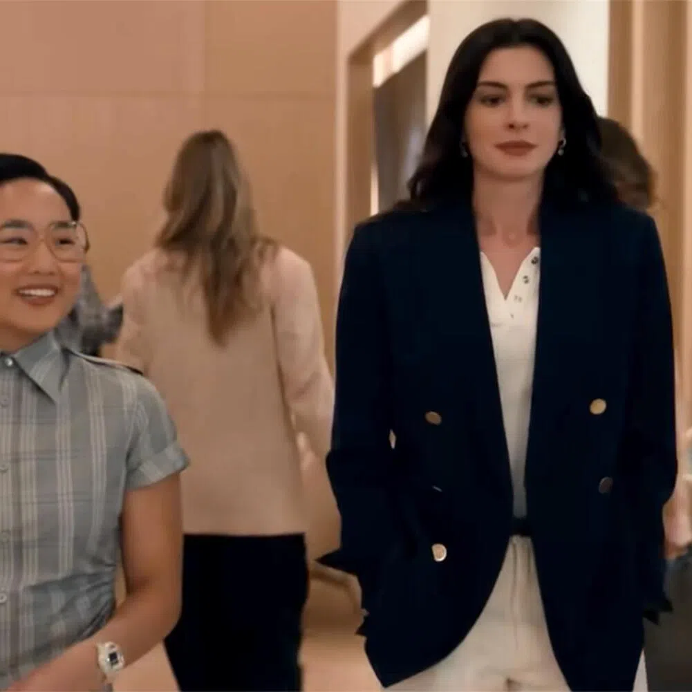 Videograb of the clip on YouTube, uploaded April 17, showing from left: Helen J. Shen as Jin Chao and Anne Hathaway as Andy. 