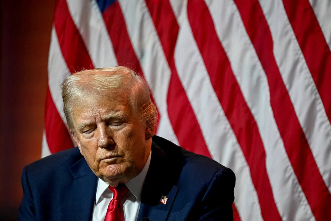 Republican presidential nominee and former U.S. President Donald Trump closes his eyes during a panel of the National Association of Black Journalists (NABJ) convention in Chicago, Illinois, U.S. July 31, 2024. REUTERS/Vincent Alban/File Photo