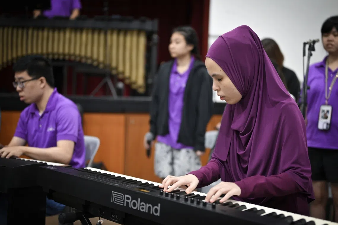 In S’pore’s largest inclusive orchestra, a single breath cues the music