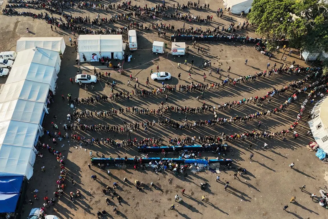 A drone view of thousands of Malawians at a Durban drive-in site amid fears of anti-immigrant violence ahead of a June 30 deadline set by activists demanding undocumented migrants leave the country, in Durban, South Africa, June 25, 2026. REUTERS/Siyabonga Sishi     TPX IMAGES OF THE DAY