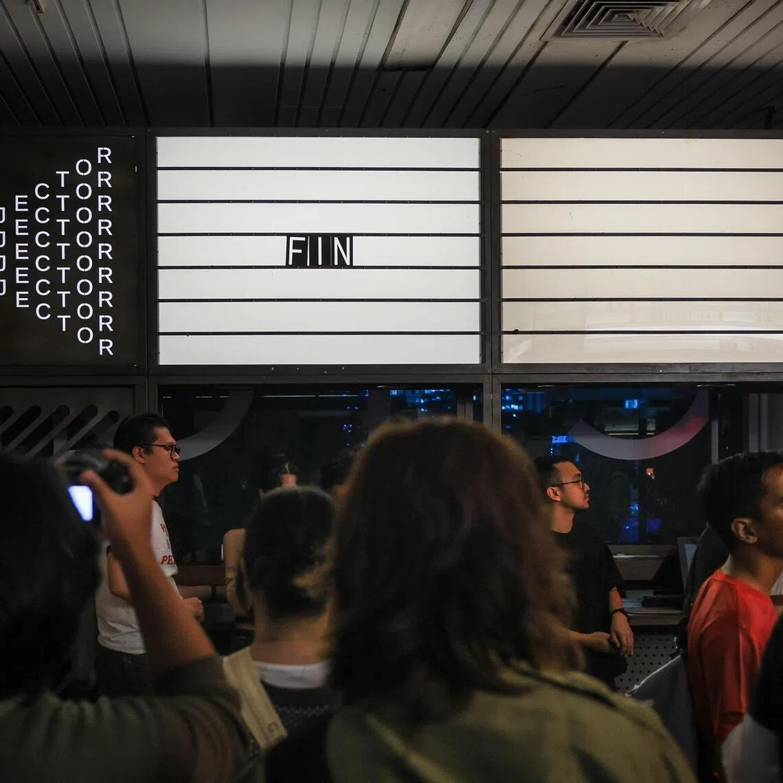 Supporters taking pictures of the cinema the unofficial farewell party for the indie cinema The Projector at Golden Mile Tower on Aug 23, 2025.