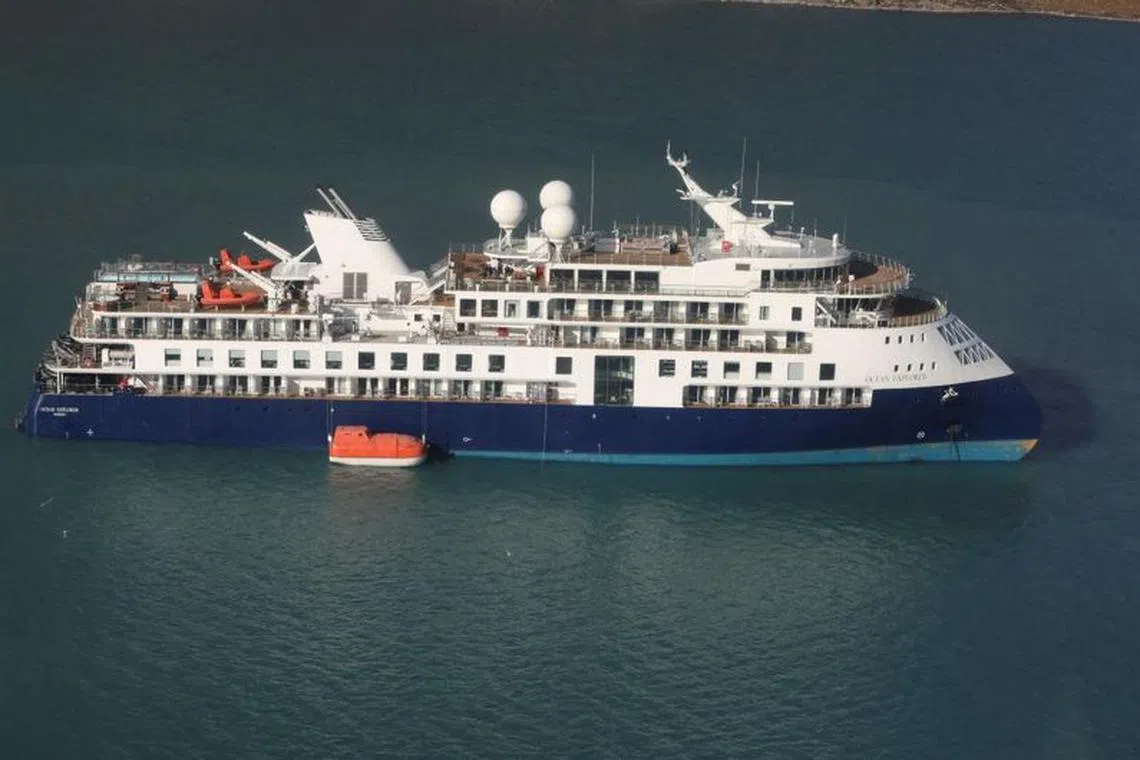View of the Ocean Explorer, a luxury cruise ship carrying 206 people that ran aground, in Alpefjord, Greenland, September 12, 2023.  Danish Air Force/Arctic Command/Handout via REUTERS