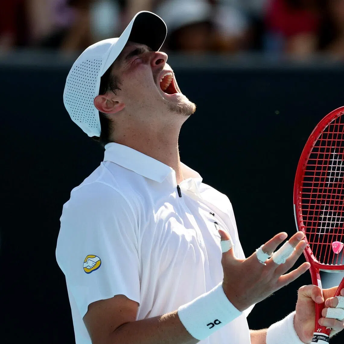 Tennis - Australian Open - Melbourne Park, Melbourne, Australia - January 20, 2026. Brazil's Joao Fonseca reacts during his first round match against Eliot Spizzirri of the U.S. REUTERS/Edgar Su