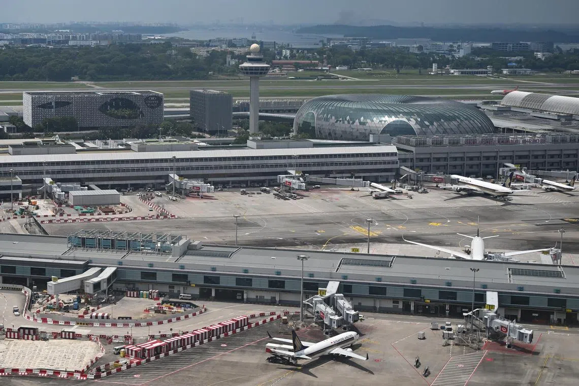 ST20240221-202447705151-Lim Yaohui-pixgeneric/
Generic photograph of Crowne Plaza Changi Airport hotel, Jewel Changi Airport, Singapore Airlines (SIA) aeroplanes and Changi Airport control tower on Feb 21, 2024.
Can be used for stories on cabin, carrier, commercial, airline, pilot, plane, oil, pollution, air, aviation, airport, fuel, travel, business and money.
(ST PHOTO: LIM YAOHUI)