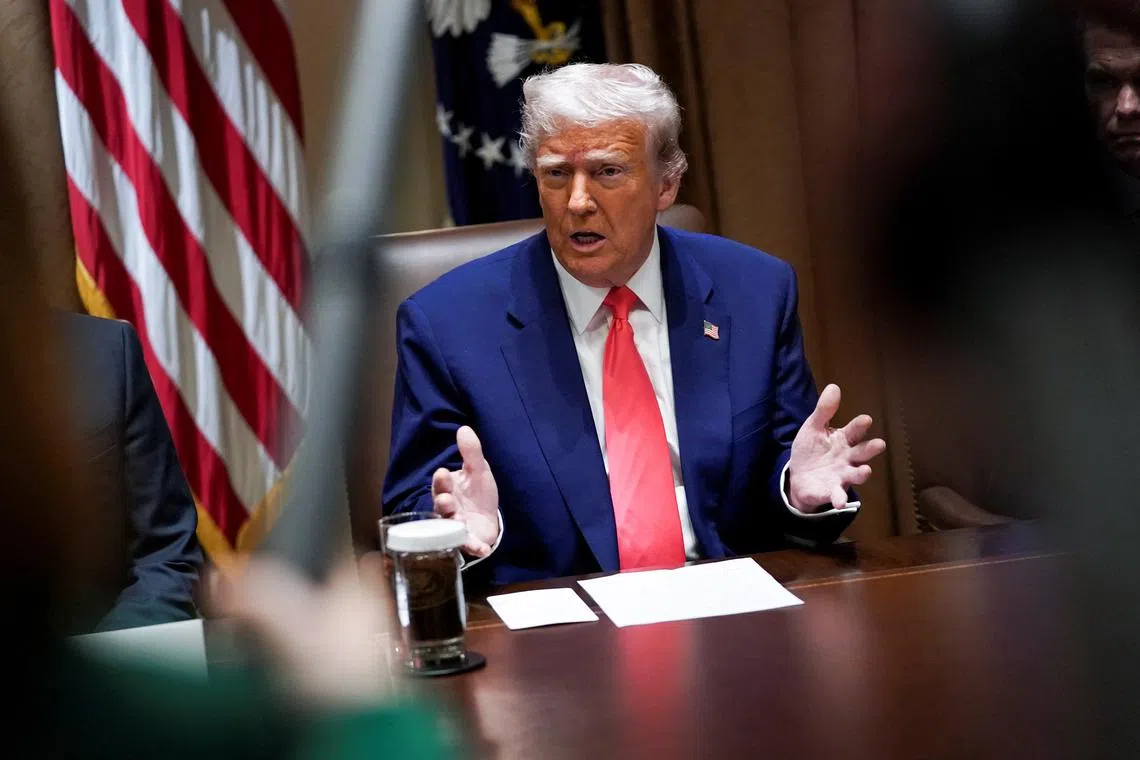 FILE PHOTO: U.S. President Donald Trump attends a cabinet meeting at the White House in Washington, D.C., U.S., April 10, 2025. REUTERS/Nathan Howard
