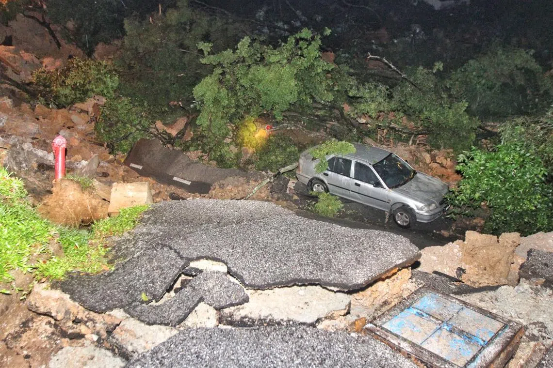 The aftermath of a landslide following heavy downpour in Puchong, Selangor, on Dec 16.