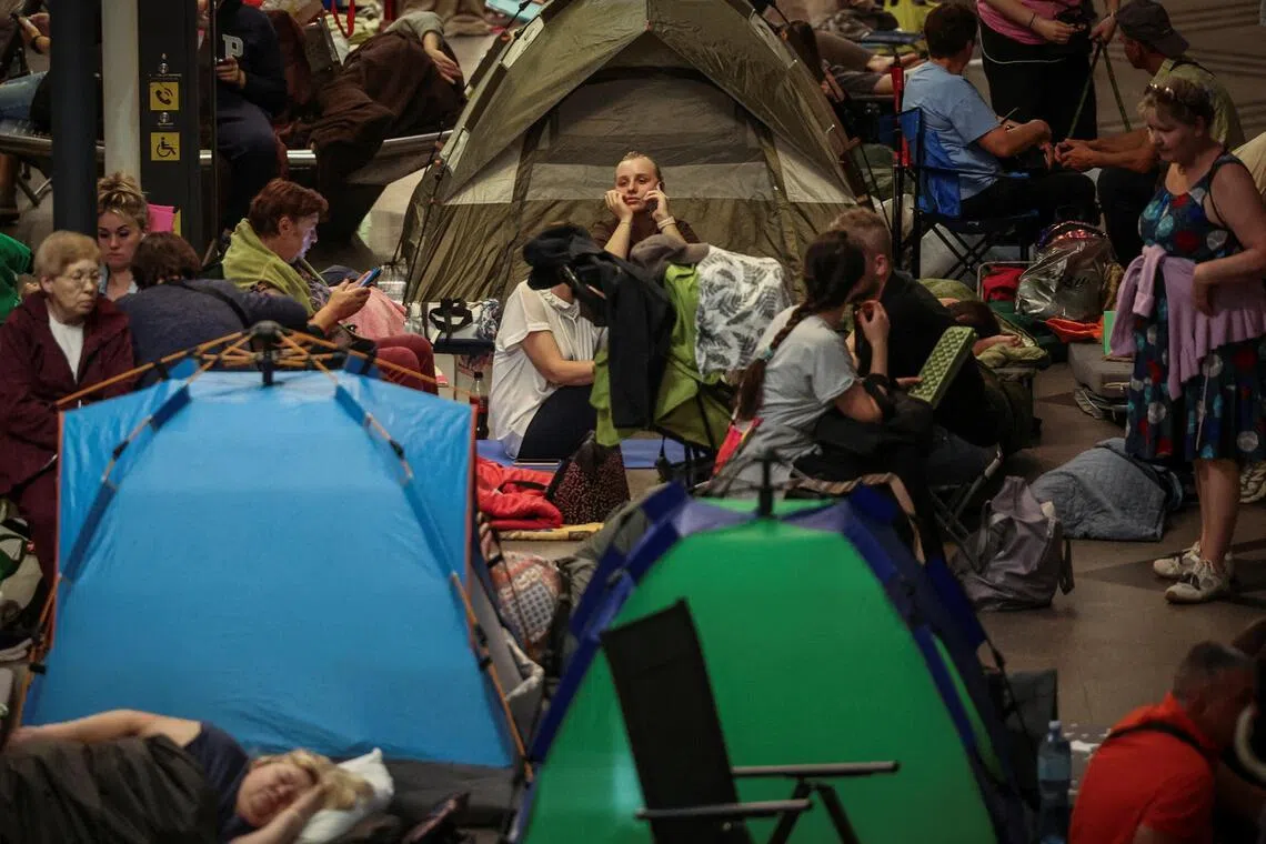 People take shelter inside a metro station during an overnight Russian missile and drone strike, amid Russia's attack on Ukraine, in Kyiv, Ukraine, July 1, 2026. REUTERS/Alina Smutko