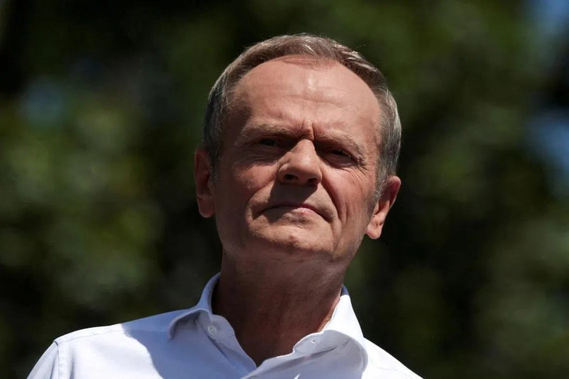 FILE PHOTO: Leader of main opposition party Civic Platform (PO) Donald Tusk takes part in the march on the 34th anniversary of the first democratic elections in postwar Poland, in Warsaw, Poland, June 4, 2023. REUTERS/Kacper Pempel//File Photo