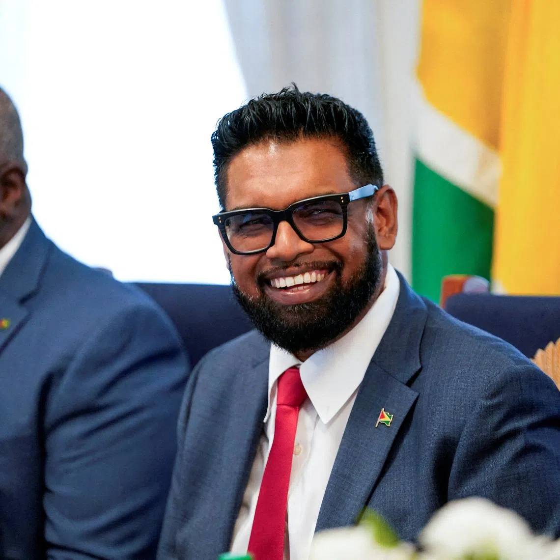 FILE PHOTO: Guyanese President Mohamed Irfaan Ali attends a meeting with U.S. Secretary of State Marco Rubio (not pictured), in Georgetown, Guyana, March 27, 2025. REUTERS/Nathan Howard/Pool/File Photo