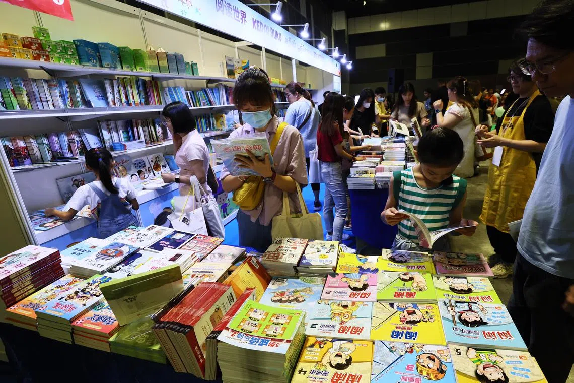 Bilingual books on display at the 12th Mother Tongue Languages Symposium held at Suntec Singapore Convention & Exhibition Centre on Aug 26. 