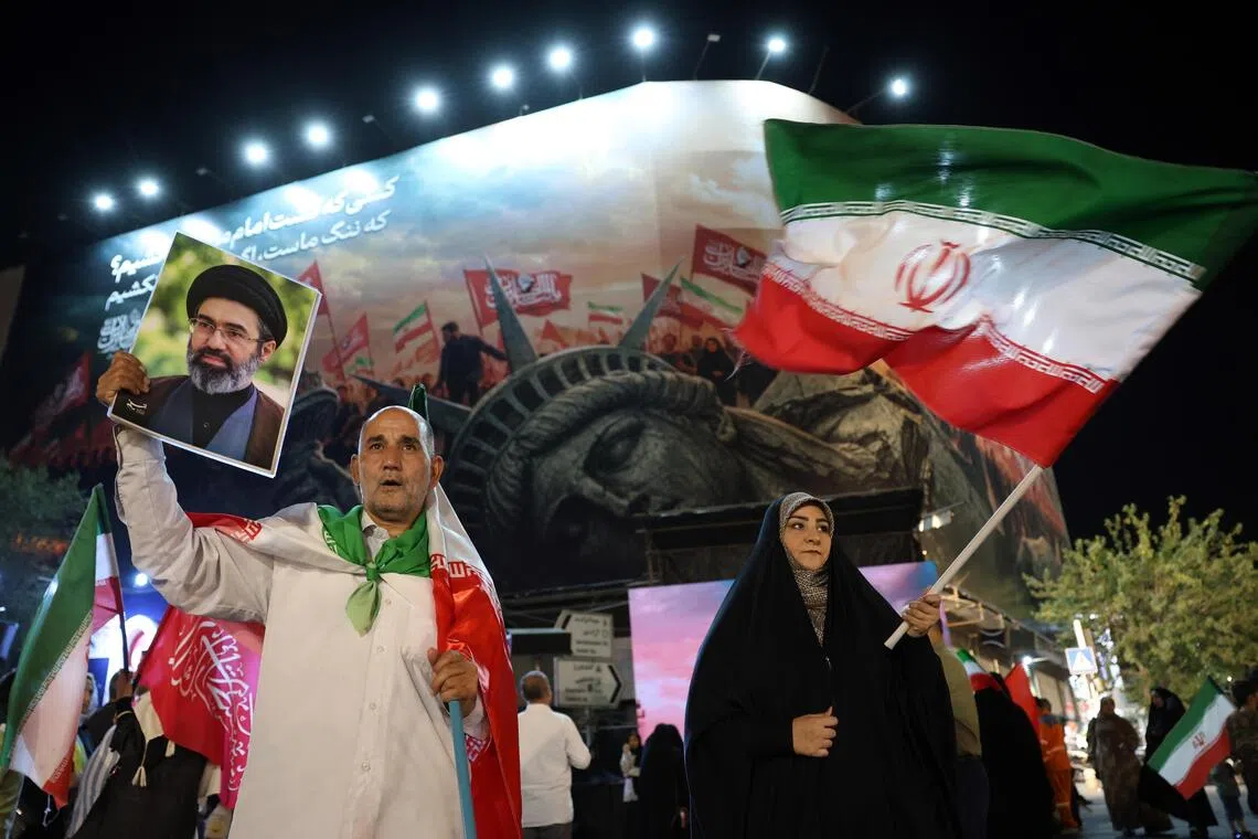 Supporters of Iran’s supreme leader Ayatollah Mojtaba Khamenei holding an anti-US rally in Tehran on Aug 26.