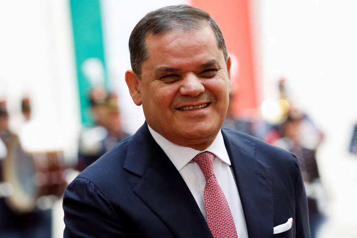 FILE PHOTO: The prime minister of Libya's U.N.-recognised Government of National Unity, Abdulhamid Dbeibah, reacts on the day he meets Italian Prime Minister Giorgia Meloni at Chigi Palace, in Rome, Italy, May 7, 2026. REUTERS/Remo Casilli/File Photo