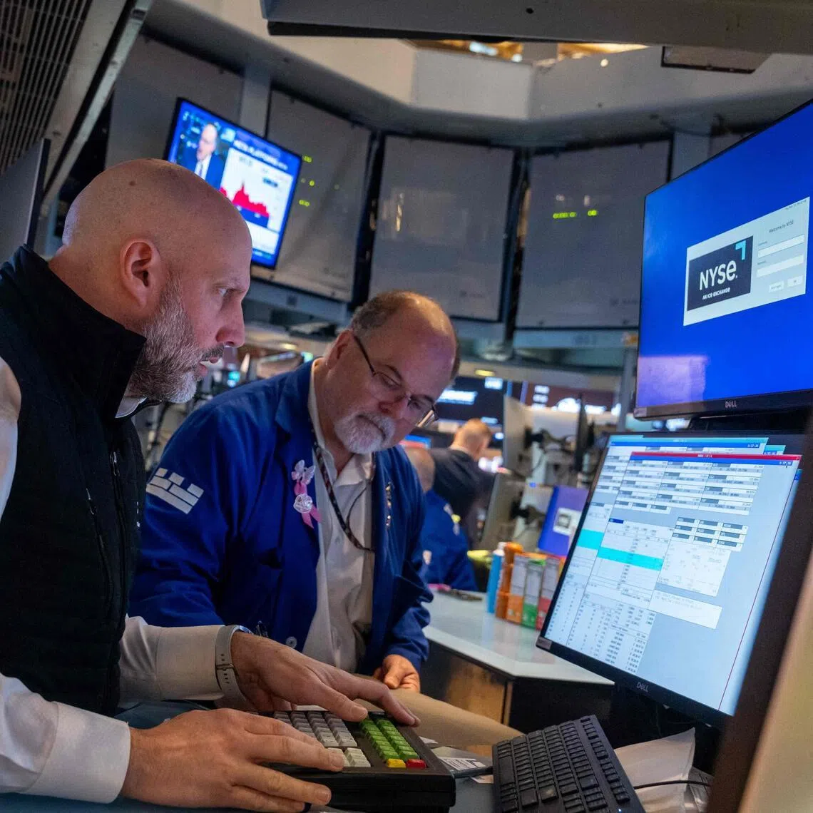 Traders working on the floor of the New York Stock Exchange on March 19,  in New York City. 