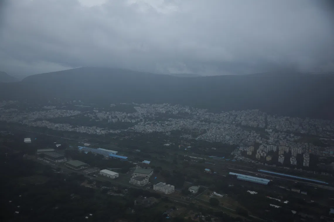 Clouds over the skyline of the city of  Visakhapatnam before Cyclone Montha makes landfall near Kakinada district in the state of Andhra Pradesh, India, October 27, 2025. REUTERS/Anushree Fadnavis