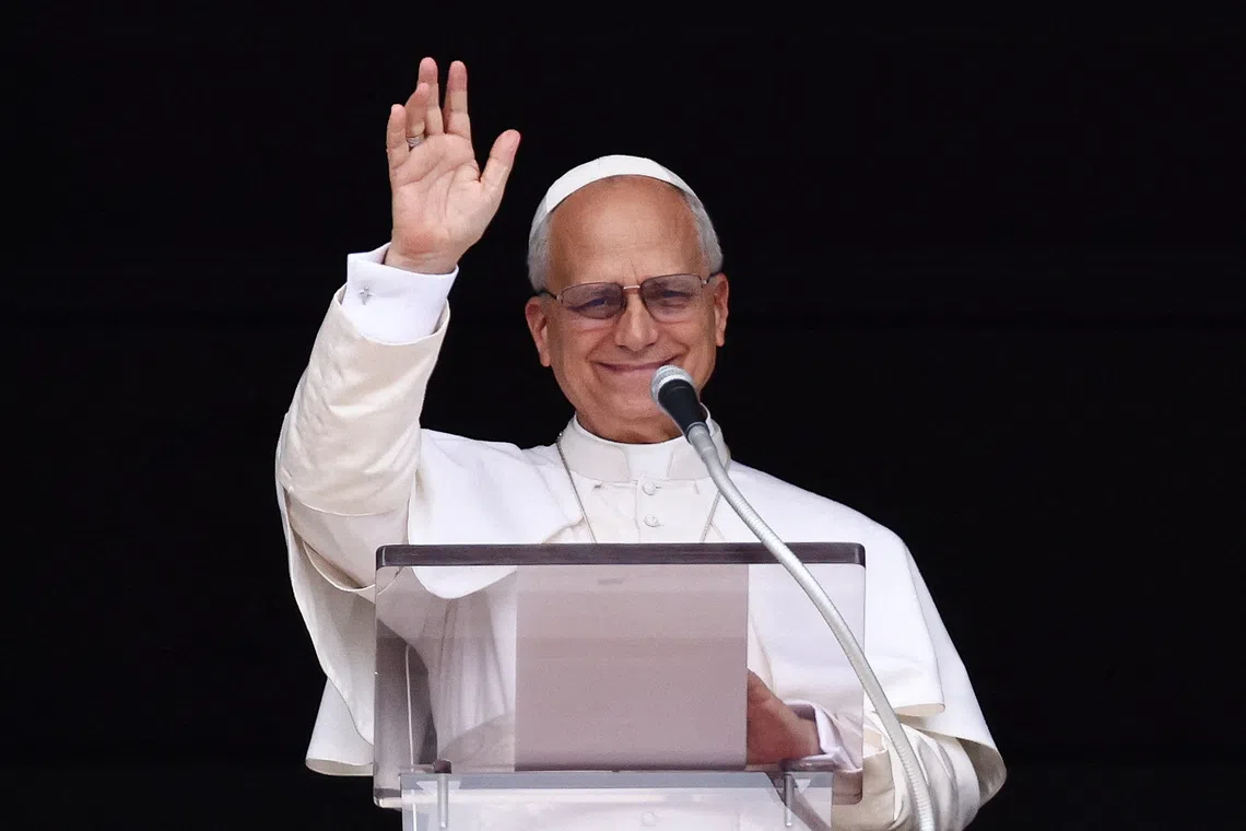 Pope Leo XIV leads the Angelus prayer on his 70th birthday, from the window of the Apostolic Palace at the Vatican, September 14, 2025. REUTERS/Vincenzo Livieri