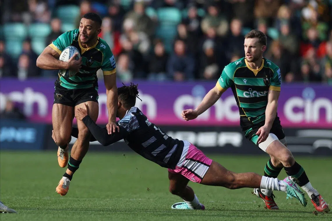 Rugby Union - Premiership - Northampton Saints v Newcastle Falcons - Franklin's Gardens, Northampton, Britain - January 27, 2024 Northampton Saint's Gabriel Hamer-Webb in action with Newcastle Falcon's Elliott Obatoyinbon. Action Images/Paul Childs