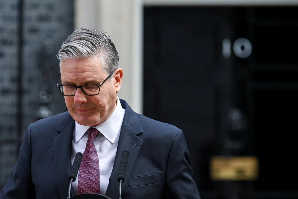 British Prime Minister Keir Starmer reacts as he announces the timeline for his resignation, outside 10 Downing Street, in London, Britain, June 22, 2026. REUTERS/Jaimi Joy