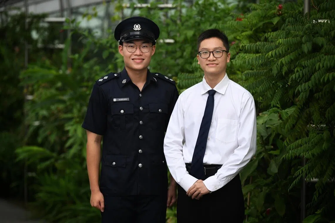 SPF scholarship recipient Raynen Ngoh (left) and HTX scholarship recipient Nathanael Alexander Kusuma at the Singapore Police Force Scholarship and Ministry of Home Affairs Scholarships Award Ceremony on Aug 18.
