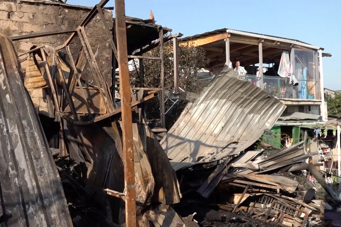 A damaged private house following an overnight attack, what local authorities called a Ukrainian drone strike, in the course of the Russia-Ukraine conflict in Novorossiysk, Russia, in this still image taken from video released on August 12, 2026.  Operations Headquarters of Krasnodar Region/Handout via REUTERS