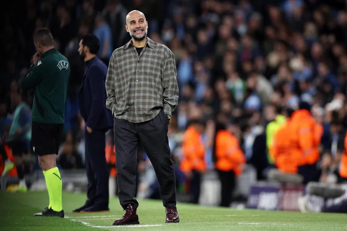 Manchester City manager Pep Guardiola watches from the touchline during the Champions League match against Real Madrid.