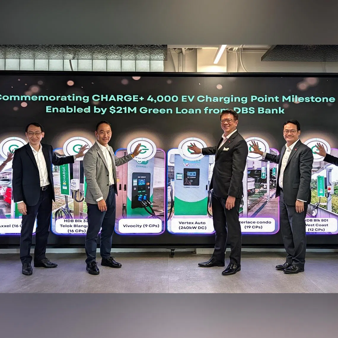 Mr Ong Tze Boon (third from left), chairman of Charge+, says the operator is aiming for 30,000 charging points globally by 2030.
