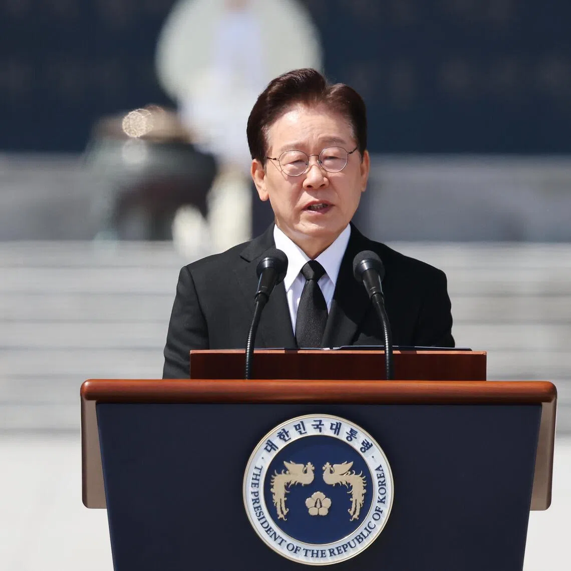 epa13019499 South Korean President Lee Jae-myung delivers his speech during a ceremony marking the country's 71st Memorial Day to commemorate veterans and independence activists at the National Cemetery in Seoul, South Korea, 06 June 2026.  EPA/KIM HONG-JI / POOL