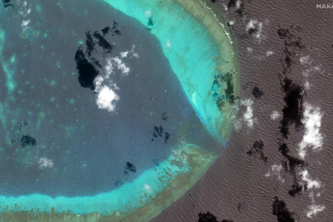 Chinese H-6 bombers fly at the eastern edge of the disputed Scarborough Shoal in the South China Sea on March 24, 2025.