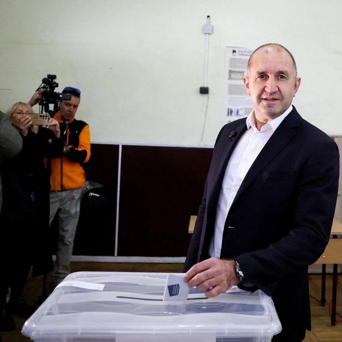 Rumen Radev, former Bulgarian president and leader of Progressive Bulgaria coalition, votes during the parliamentary election, in Sofia, Bulgaria. REUTERS/Stoyan Nenov