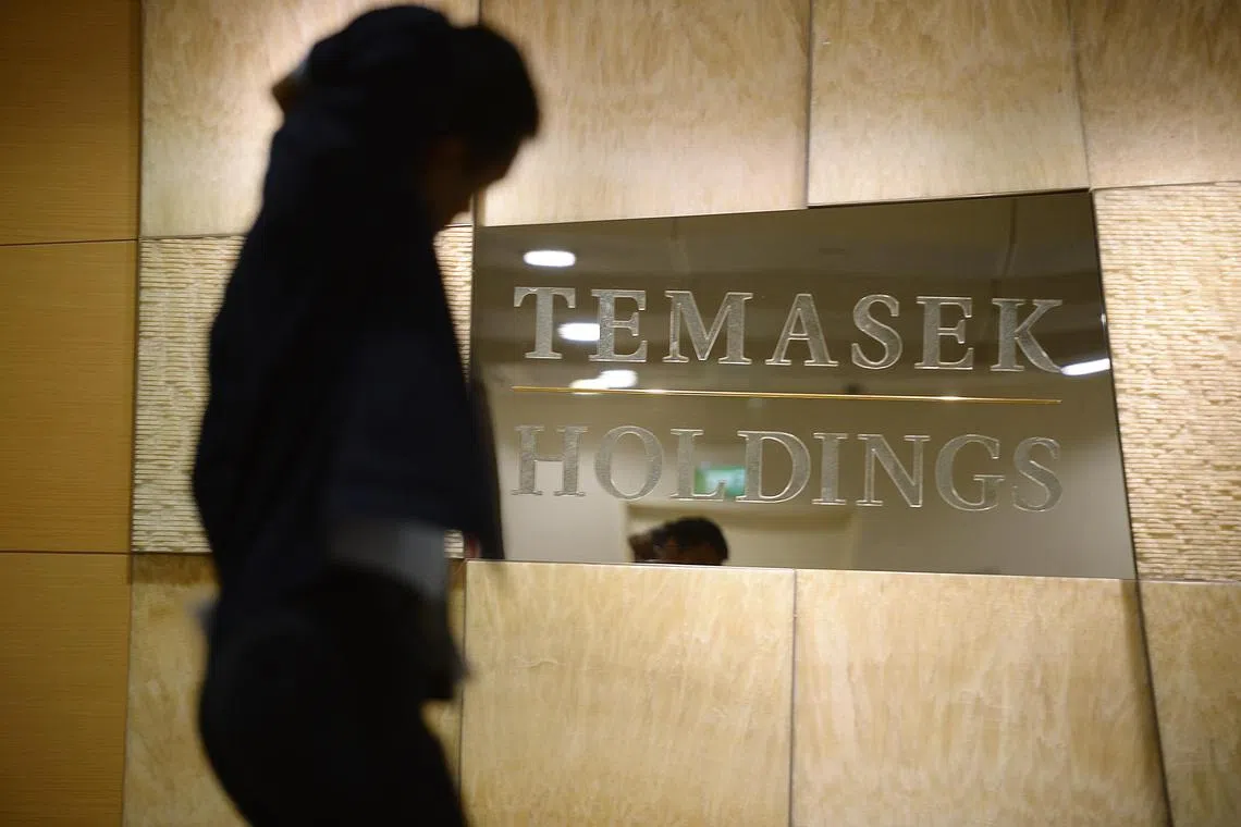 A man walks past the Temasek Holdings office on 16 February 2015.