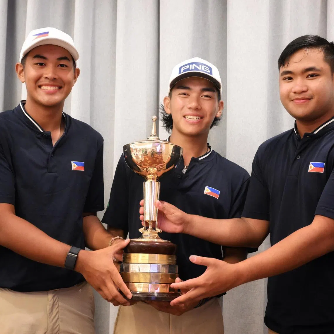 From left: Filipinos Jet Hernandez, Enrique Dimayuga and Carl Jano Corpus posing with the South-east Asian Amateur Team Golf Championships men’s Putra Cup on July 12, 2024.