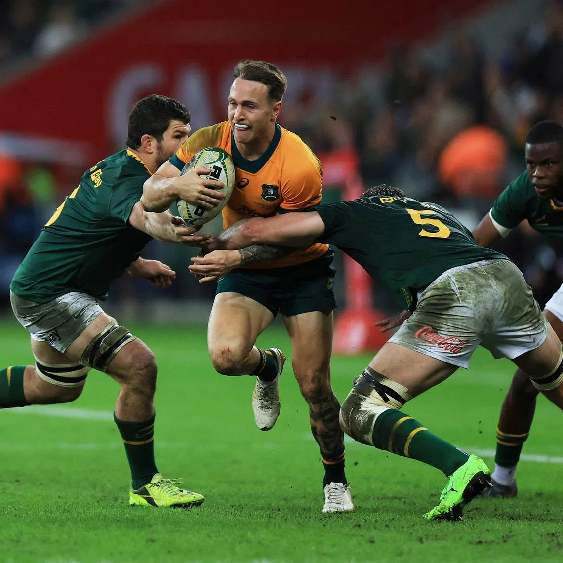 FILE PHOTO: Rugby Union - Rugby Championship - South Africa v Australia - DHL Stadium, Cape Town, South Africa - August 23, 2025  Australia's Corey Toole in action with South Africa's Ruan Nortje REUTERS/Esa Alexander/File Photo