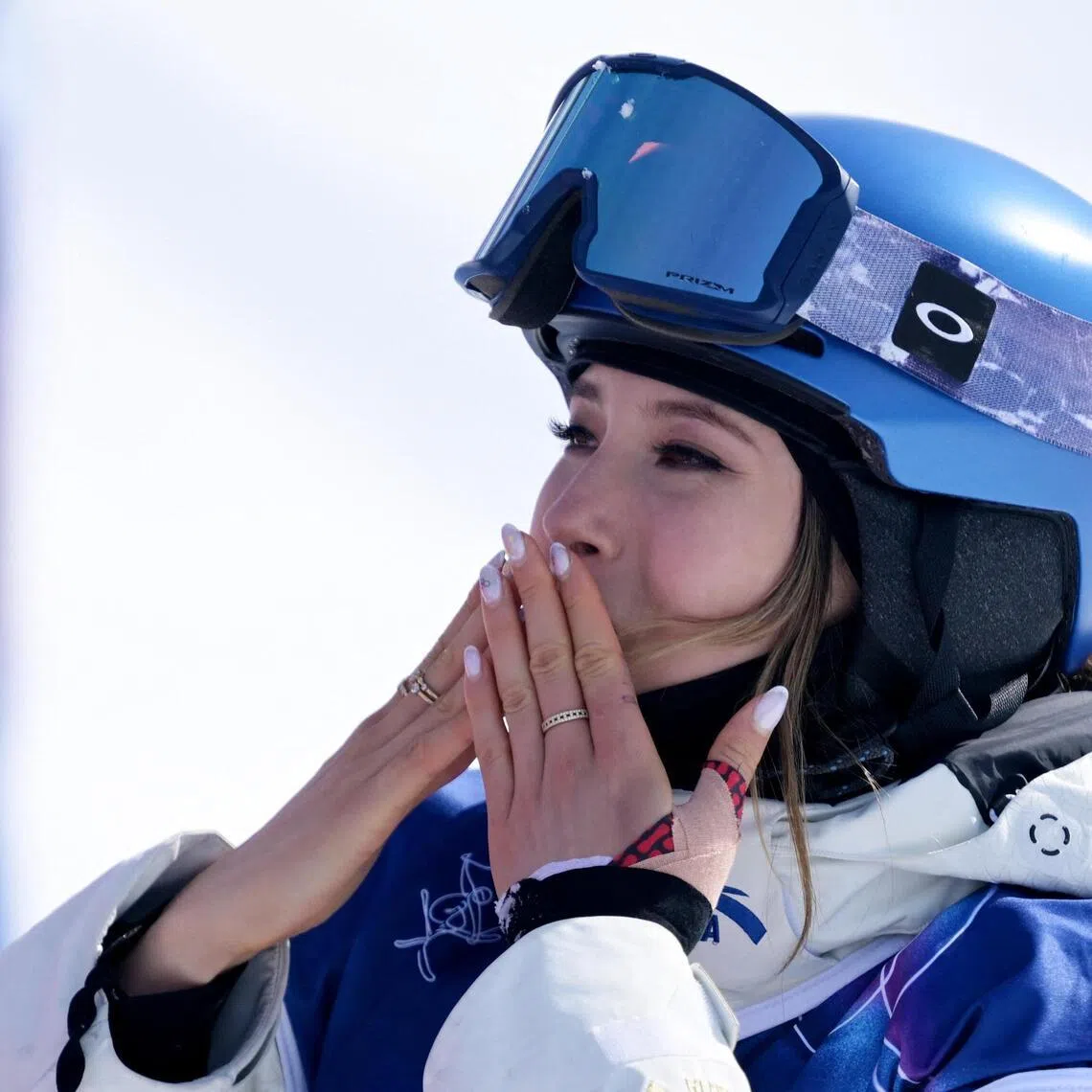 Gold medallist Eileen Gu of China celebrating after winning the 2026 Milano-Cortina Winter Olympics women's freeski halfpipe final at Livigno Snow Park on Feb 22, 2026.
