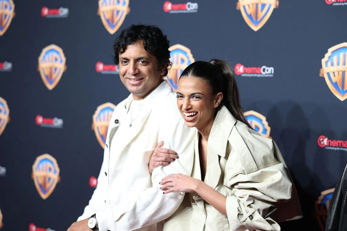 US producer M. Night Shymalan (L) and daughter US director and writer Ishana Night Shyamalan pose during a Warner Bros Pictures photo opp as they arrive to promote “The Watchers” during CinemaCon 2024 at Caesars Palace in Las Vegas, Nevada, on April 9, 2024. (Photo by Ronda Churchill / AFP)